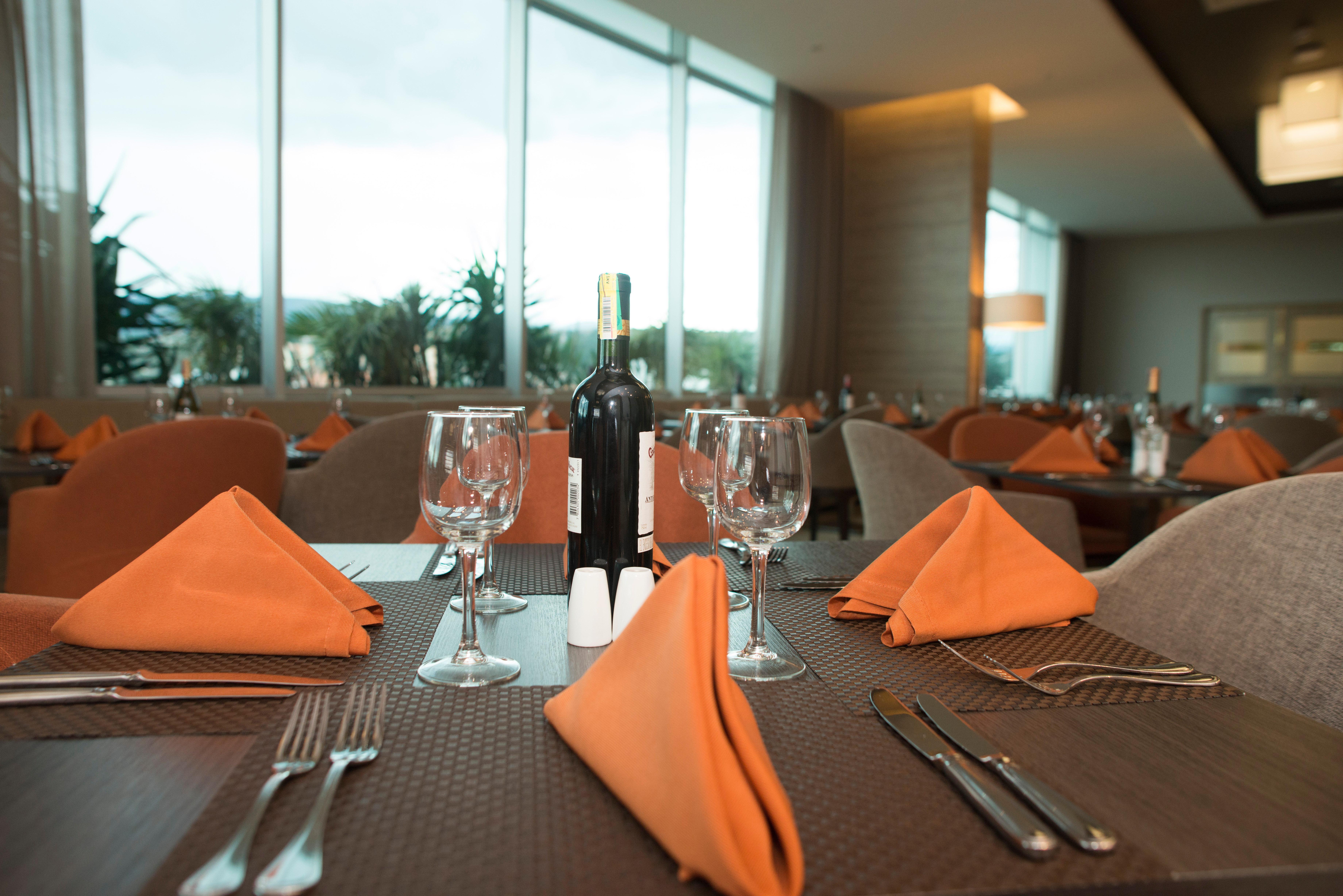 Holiday Inn Cucuta By Ihg Екстериор снимка A table set for fine dining