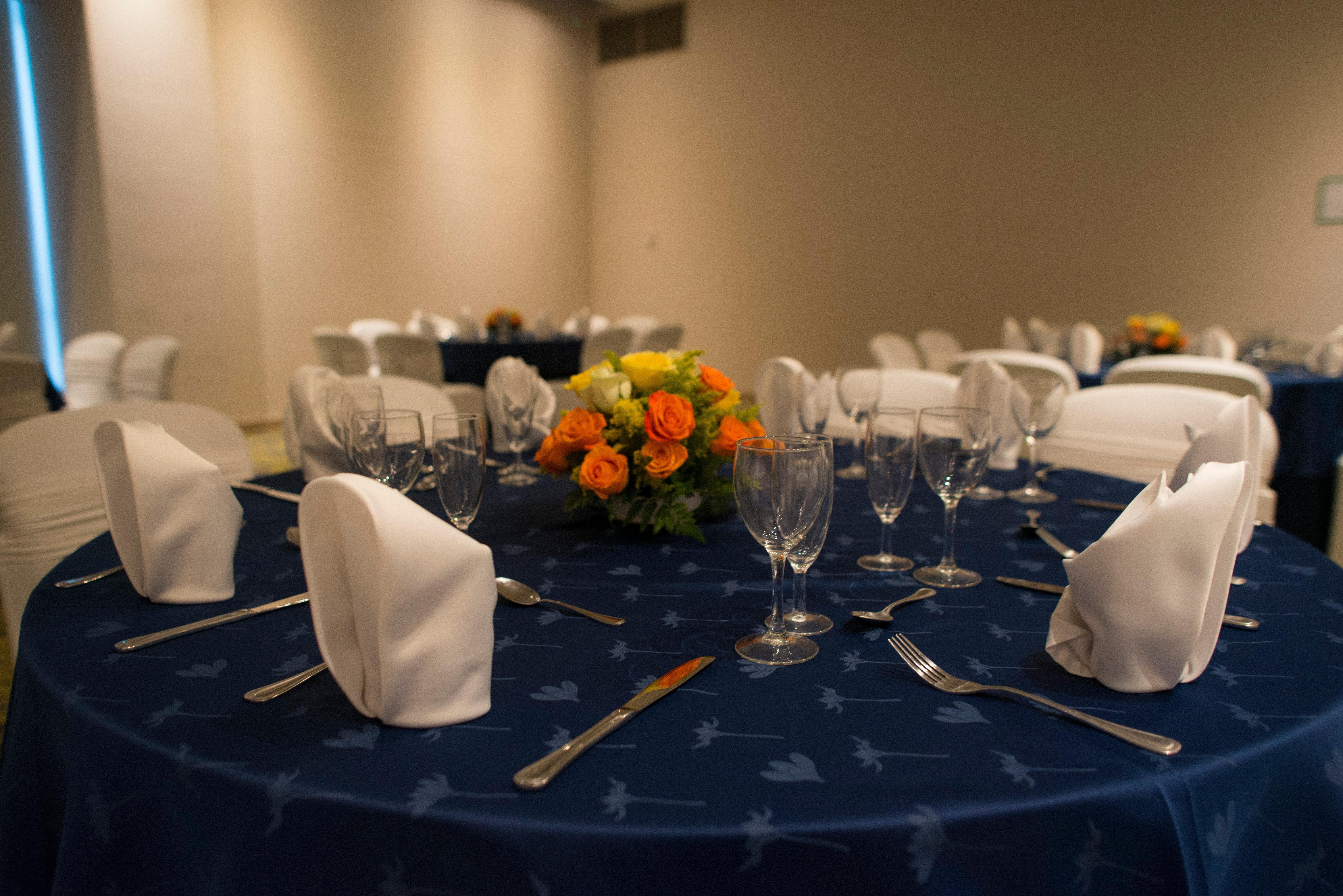 Holiday Inn Cucuta By Ihg Екстериор снимка A table set for a formal dinner
